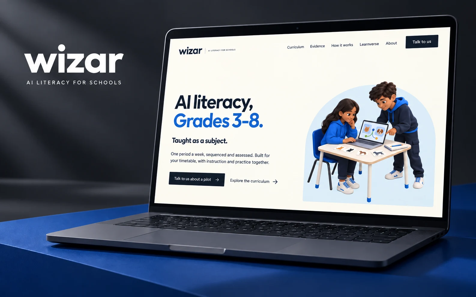 Wizar's school website presented on a laptop.