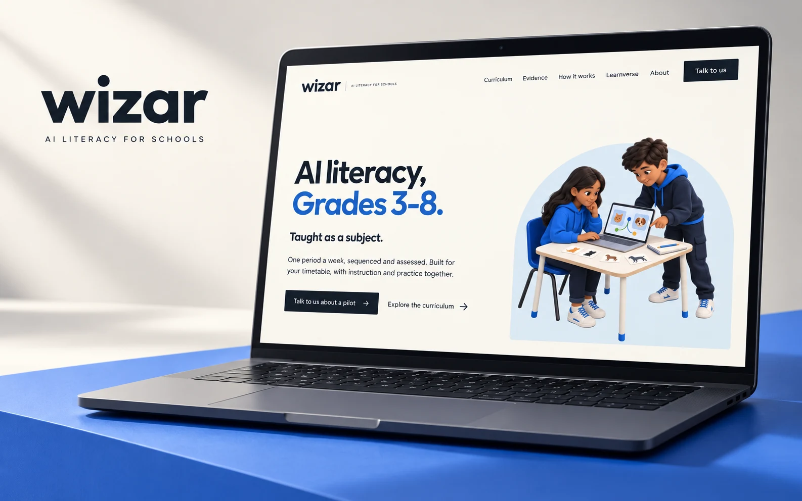 Wizar's school website presented on a laptop.